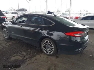 2018 Ford Fusion Hybrid Titanium with VIN 3FA6P0RU0JR269389, listed as a IAAI auction lot 41736152 with 112,640 mi miles. Bid and sale history available at carsss.com. Image 3.
