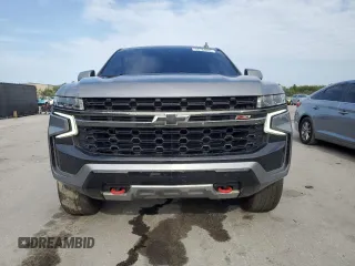 2021 Chevrolet Suburban Z71 с VIN 1GNSKDKD9MR385447, выставлен на аукционе Copart как лот 55764935 с пробегом 74 241 миль миль и Списание • Salvage title. История ставок и продаж доступна на DreamBid. Изображение 5.