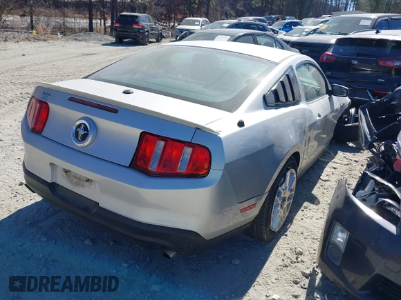 2012 Ford Mustang V6 Premium with VIN 1ZVBP8AM1C5265745, listed as a IAAI auction lot 41705931 with 145,000 mi miles. Bid and sale history available at carsss.com. Image 4.