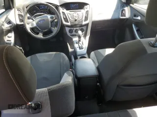 2012 Ford Focus SE z VIN 1FAHP3F23CL328787, wystawiony jako Copart lot #63186125 z przebiegiem 198 629 mil mil oraz Szkoda całkowita • Salvage title. Historia ofert i sprzedaży dostępna na DreamBid. Obrazek 8.