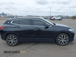 2020 BMW X2 xDrive28i with VIN WBXYJ1C02L5R71755, listed as a IAAI auction lot 41957012 with 69,997 mi miles. Bid and sale history available at carsss.com. Image 14.