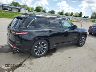 2023 Jeep Grand Cherokee Overland with VIN 1C4RJHDG0PC670537, listed as a Copart auction lot 56757285 with 24,735 mi miles and Salvage title. Bid and sale history available at DreamBid. Image 3.