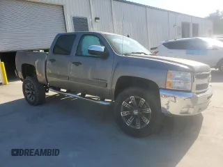 2013 Chevrolet Silverado 1500 LT with VIN 3GCPKSE76DG121935, listed as a Copart auction lot 50785745 with 139,421 mi miles and Salvage Title. Bid and sale history available at DreamBid. Image 4.
