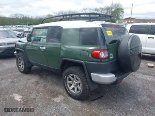 2014 Toyota FJ Cruiser with VIN JTEBU4BF1EK203587, listed as a IAAI auction lot 41978010 with 62,438 mi miles. Bid and sale history available at carsss.com. Image 3.