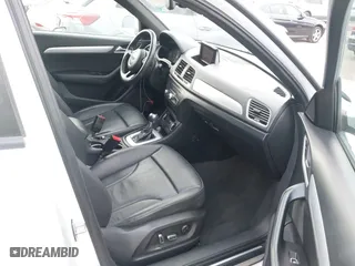 2018 Audi Q3 Premium with VIN WA1BCCFSXJR028356, listed as a IAAI auction lot 41761544 with 82,877 mi miles. Bid and sale history available at carsss.com. Image 5.