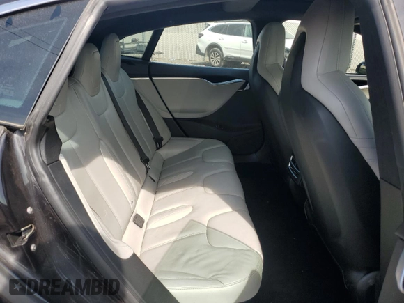 2016 Tesla Model S 90D with VIN 5YJSA1E28GF131212, listed as a Copart auction lot 54176705 with 97,373 mi miles and Salvage Title. Bid and sale history available at DreamBid. Image 10.