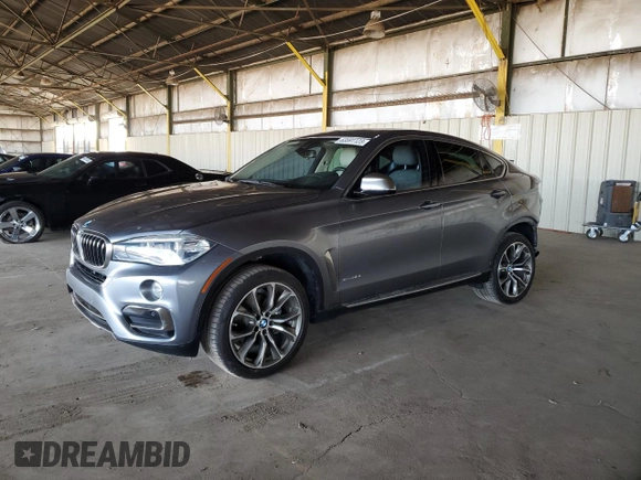 2015 BMW X6 xDrive35i with VIN 5UXKU2C59F0N77312, listed as a Copart auction lot 63591123 with 121,105 mi miles. Bid and sale history available at carsss.com. Image 1.