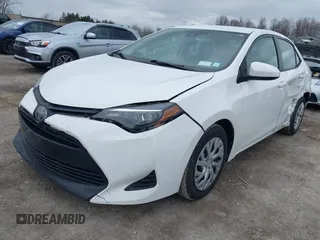 2019 Toyota Corolla L with VIN 5YFBURHE0KP889909, listed as a IAAI auction lot 41888953 with 130,529 mi miles. Bid and sale history available at carsss.com. Image 18.