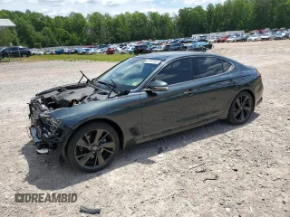 2023 Genesis G70 2.0T with VIN KMTG34TA2PU115589, listed as a Copart auction lot 57391885 with 53,817 mi miles and Salvage title. Bid and sale history available at DreamBid. Image 1.