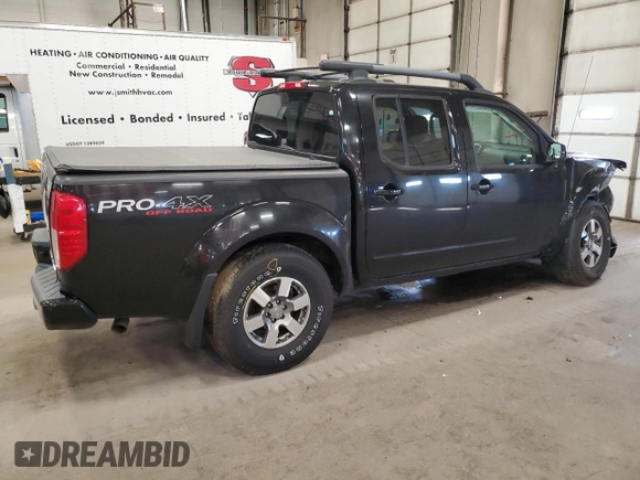 2011 Nissan Frontier Pro-4X with VIN 1N6AD0EVXBC449326, listed as a Copart auction lot 54994455 with 93,841 mi miles and Salvage title. Bid and sale history available at DreamBid. Image 3.