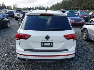 2023 Volkswagen Tiguan SE R-Line Black with VIN 3VVCB7AX3PM014446, listed as a IAAI auction lot 42016885 with 12,726 mi miles and . Bid and sale history available at DreamBid. Image 16.