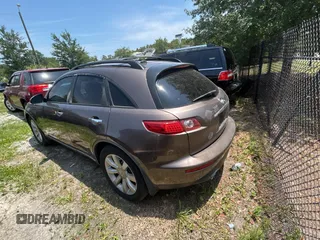 2003 Infiniti FX Options z VIN JNRAS08W93X205643, wystawiony jako Copart lot #58410885 z przebiegiem 210 110 mil mil oraz Tytuł czysty. Historia ofert i sprzedaży dostępna na DreamBid. Obrazek 3.