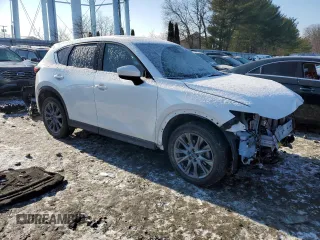 2021 Mazda CX-5 Signature with VIN JM3KFBEY5M0447759, listed as a Copart auction lot 42565535 with 24,175 mi miles and Salvage Title. Bid and sale history available at carsss.com. Image 4.