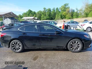 2019 Acura TLX Technology z VIN 19UUB1F52KA000293, wystawiony jako IAAI lot #42119137 z przebiegiem 29 589 mil mil oraz . Historia ofert i sprzedaży dostępna na DreamBid. Obrazek 13.