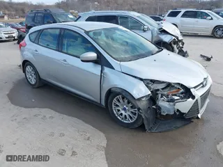 2012 Ford Focus SE with VIN 1FAHP3K27CL185977, listed as a IAAI auction lot 41674498 with 140,312 mi miles. Bid and sale history available at carsss.com. Image 1.