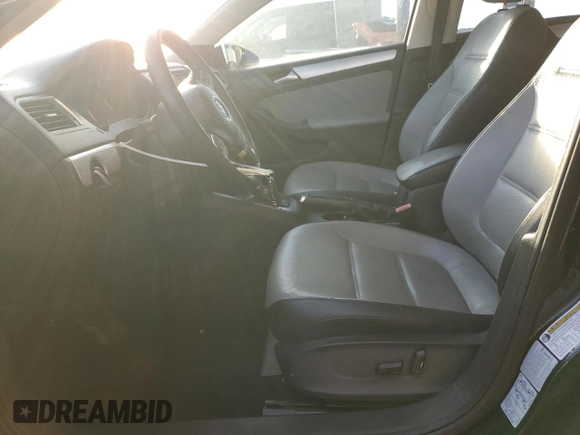 2013 Volkswagen Jetta Hybrid SE with VIN 3VW637AJ3DM303498, listed as a Copart auction lot 63505045 with 160,777 mi miles and Clean title. Bid and sale history available at DreamBid. Image 7.