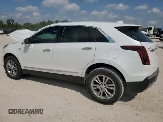 2023 Cadillac XT5 FWD Premium Luxury with VIN 1GYKNCRS7PZ150378, listed as a Copart auction lot 71792184 with 21,631 mi miles and Salvage Title. Bid and sale history available at carsss.com. Image 2.