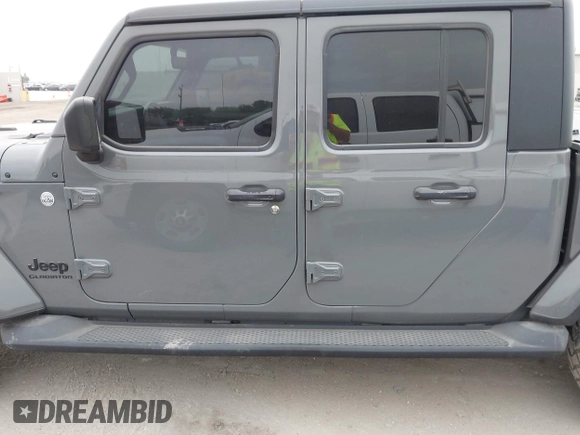 2022 Jeep Gladiator Willys with VIN 1C6JJTAMXNL137237, listed as a IAAI auction lot 41947651 with 55,199 mi miles and . Bid and sale history available at DreamBid. Image 14.