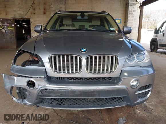 2012 BMW X5 35d with VIN 5UXZW0C59CL673416, listed as a IAAI auction lot 41910233 with 70,008 mi miles and . Bid and sale history available at DreamBid. Image 12.
