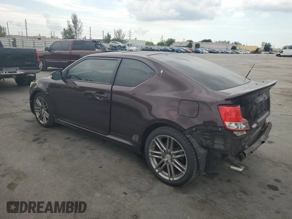 2012 Scion tC with VIN JTKJF5C7XC3032281, listed as a Copart auction lot 50472225 with 101,304 mi miles and Salvage Title. Bid and sale history available at carsss.com. Image 2.