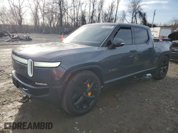 2022 Rivian R1T Adventure Package with VIN 7FCTGAAAXNN005667, listed as a Copart auction lot 44321435 with 48,249 mi miles and Salvage Title. Bid and sale history available at carsss.com. Image 1.