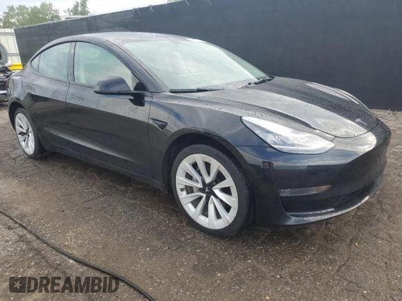 2023 Tesla Model 3 with VIN 5YJ3E1EA8PF438542, listed as a Copart auction lot 66329695 with 71,639 mi miles and Clean title. Bid and sale history available at DreamBid. Image 4.