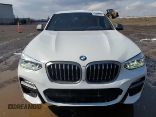 2019 BMW X4 M40i with VIN 5UXUJ5C58KLA93517, listed as a Copart auction lot 51622125 with 127,828 mi miles and Salvage title. Bid and sale history available at DreamBid. Image 5.