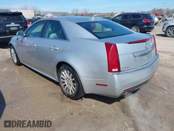 2013 Cadillac CTS Luxury z VIN 1G6DG5E56D0112860, wystawiony jako IAAI lot #41970874 z przebiegiem 125 647 mil mil oraz . Historia ofert i sprzedaży dostępna na DreamBid. Obrazek 3.