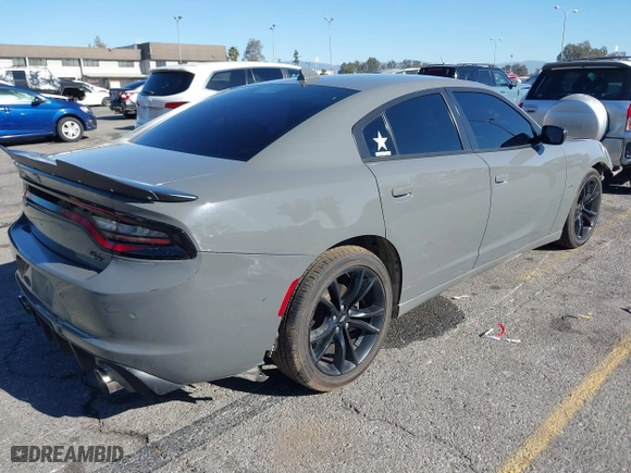 2018 Dodge Charger Daytona with VIN 2C3CDXCT0JH337673, listed as a IAAI auction lot 41244351 with 96,738 mi miles. Bid and sale history available at carsss.com. Image 4.