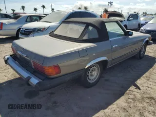 1979 Mercedes-Benz SL with VIN 10704412056845, listed as a Copart auction lot 74874294 with 148,200 mi miles and Salvage title. Bid and sale history available at DreamBid. Image 3.