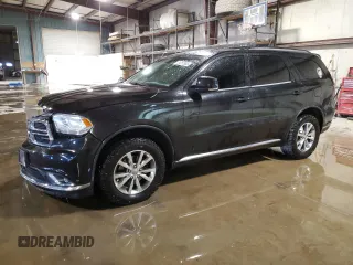 2015 Dodge Durango Limited with VIN 1C4RDJDG0FC128013, listed as a Copart auction lot 51257905 with 141,675 mi miles and Salvage title. Bid and sale history available at DreamBid. Image 1.