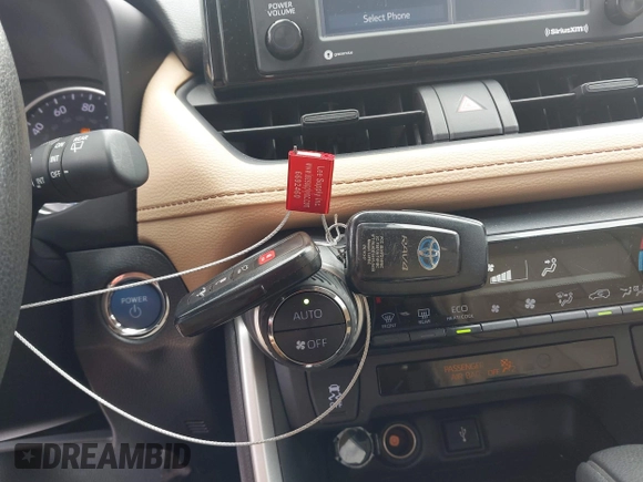 2020 Toyota RAV4 Hybrid XLE with VIN 2T3RWRFV5LW094731, listed as a IAAI auction lot 42349123 with 60,927 mi miles and . Bid and sale history available at DreamBid. Image 11.