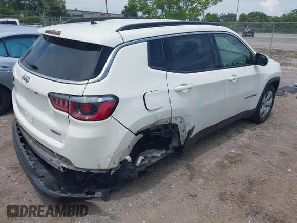 2018 Jeep Compass Latitude with VIN 3C4NJCBB8JT293444, listed as a IAAI auction lot 42372611 with 38,928 mi miles and . Bid and sale history available at DreamBid. Image 4.