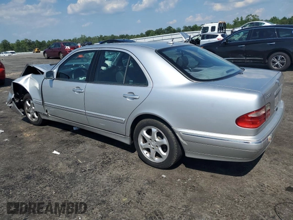 2002 Mercedes-Benz E-Class with VIN WDBJF65J12B393729, listed as a Copart auction lot 59722643 with 289,974 mi miles and Salvage Title. Bid and sale history available at carsss.com. Image 2.