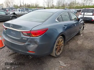 2016 Mazda Mazda6 i Touring with VIN JM1GJ1V56G1439360, listed as a IAAI auction lot 41987987 with 155,271 mi miles. Bid and sale history available at carsss.com. Image 4.