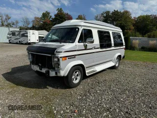 1990 GMC Vandura z VIN 1GDEG25K5L7522525, wystawiony jako Copart lot #75007594 z przebiegiem 91 857 mil mil oraz Szkody całkowita. Historia ofert i sprzedaży dostępna na DreamBid. Obrazek 2.