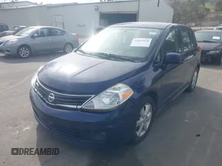 2012 Nissan Versa S with VIN 3N1BC1CPXCK250182, listed as a IAAI auction lot 41697818 with 122,450 mi miles. Bid and sale history available at carsss.com. Image 2.