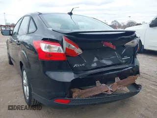 2012 Ford Focus SE with VIN 1FAHP3F25CL446064, listed as a IAAI auction lot 41883353 with 142,468 mi miles. Bid and sale history available at carsss.com. Image 6.