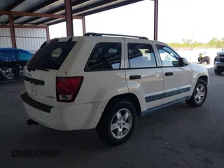 2005 Jeep Grand Cherokee Laredo with VIN 1J4GS48K15C536705, listed as a IAAI auction lot 41800947 with 0 mi miles. Bid and sale history available at carsss.com. Image 4.