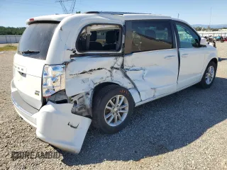 2018 Dodge Grand Caravan SXT with VIN 2C4RDGCG4JR360103, listed as a Copart auction lot 53209605 with 153,827 mi miles and Salvage Title. Bid and sale history available at DreamBid. Image 3.
