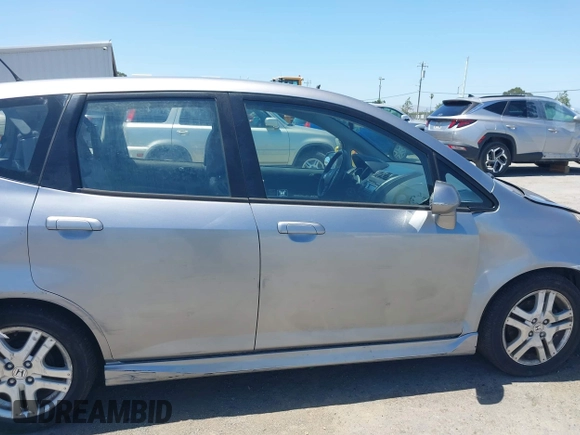 2007 Honda Fit Sport with VIN JHMGD38637S067718, listed as a IAAI auction lot 42348751 with 135,198 mi miles and . Bid and sale history available at DreamBid. Image 13.