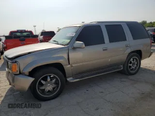 2000 Cadillac Escalade z VIN 1GYEK63R2YR210601, wystawiony jako Copart lot #64108944 z przebiegiem 186 964 mil mil oraz Szkody całkowita. Historia ofert i sprzedaży dostępna na DreamBid. Obrazek 1.