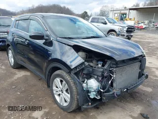 2018 Kia Sportage LX with VIN KNDPMCAC3J7380179, listed as a IAAI auction lot 41672067 with 134,390 mi miles. Bid and sale history available at carsss.com. Image 1.