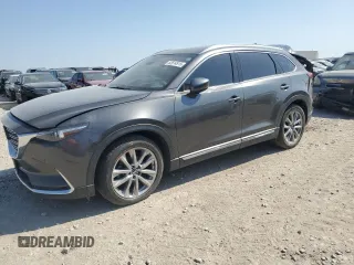 2018 Mazda CX-9 Grand Touring z VIN JM3TCBDY9J0207740, wystawiony jako Copart lot #52614515 z przebiegiem 142 309 mil mil oraz Szkoda całkowita • Salvage title. Historia ofert i sprzedaży dostępna na DreamBid. Obrazek 1.