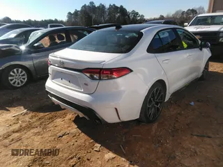 2022 Toyota Corolla SE with VIN 5YFS4MCE5NP110485, listed as a IAAI auction lot 41236740 with 52,727 mi miles. Bid and sale history available at carsss.com. Image 4.