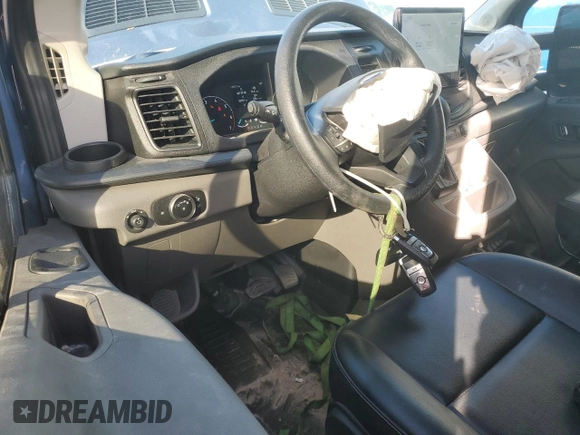 2024 Ford Transit Cargo with VIN 1FTRU8XG8RKA15196, listed as a Copart auction lot 84198984 with 12,267 mi miles and Salvage Title. Bid and sale history available at DreamBid. Image 8.