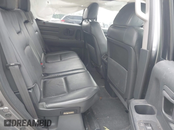 2013 Honda Ridgeline RTL with VIN 5FPYK1F56DB004834, listed as a IAAI auction lot 42706361 with 230,000 mi miles and . Bid and sale history available at DreamBid. Image 8.