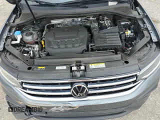 2023 Volkswagen Tiguan S z VIN 3VVRB7AX4PM043335, wystawiony jako Copart lot #59045145 z przebiegiem 31 659 mil mil oraz Szkoda całkowita • Salvage title. Historia ofert i sprzedaży dostępna na DreamBid. Obrazek 12.