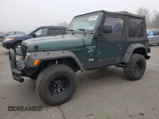 1999 Jeep Wrangler Sport z VIN 1J4FY19SXXP427968, wystawiony jako Copart lot #50102855 z przebiegiem 174 381 mil mil oraz Czysty tytuł • Clean title. Historia ofert i sprzedaży dostępna na DreamBid. Obrazek 1.
