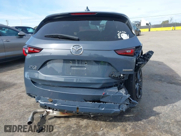 2023 Mazda CX-5 2.5 S Carbon Edition with VIN JM3KFBCM9P0240506, listed as a IAAI auction lot 41583703 with 23,173 mi miles. Bid and sale history available at carsss.com. Image 17.
